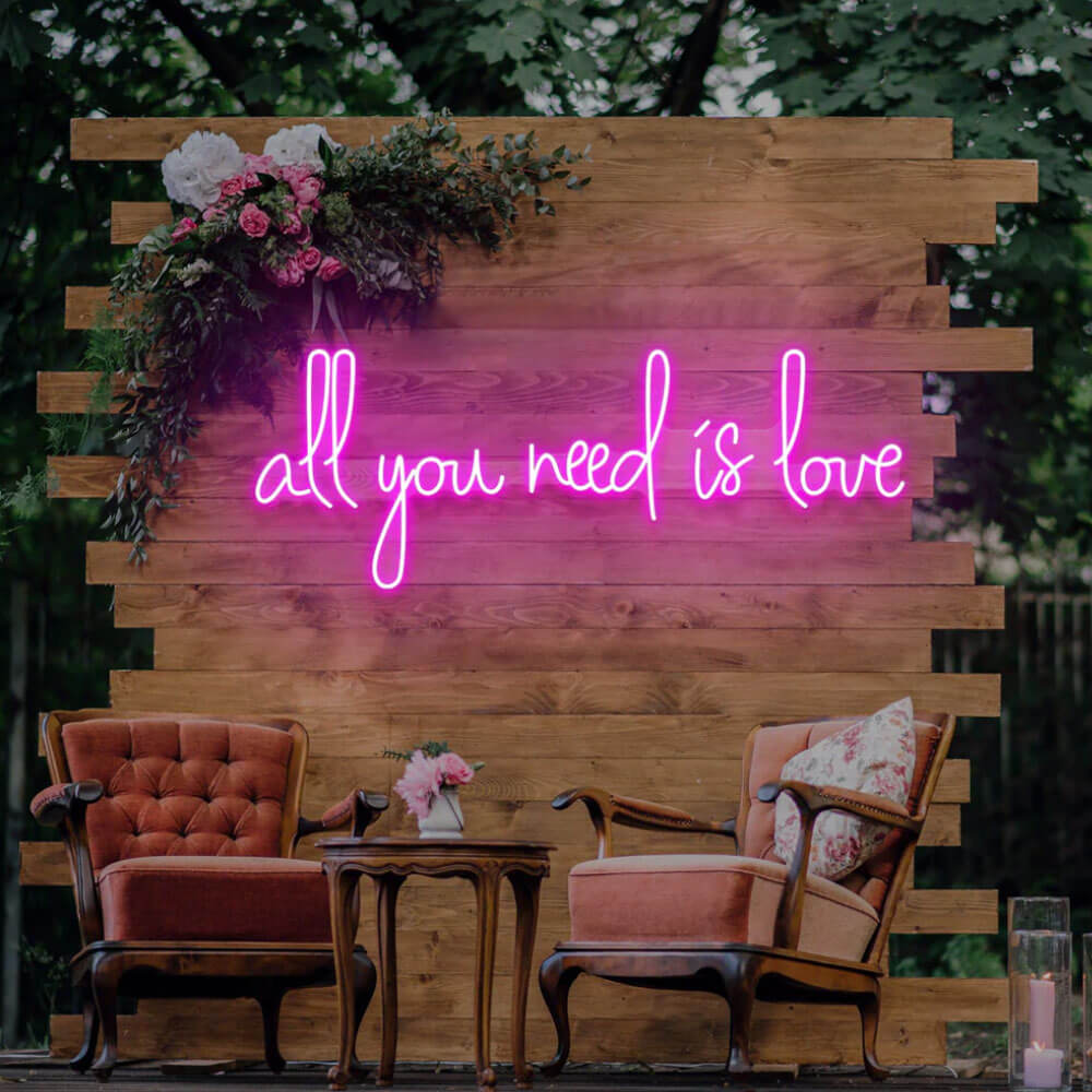 all you need is love neon sign pink