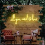 all you need is love neon sign yellow