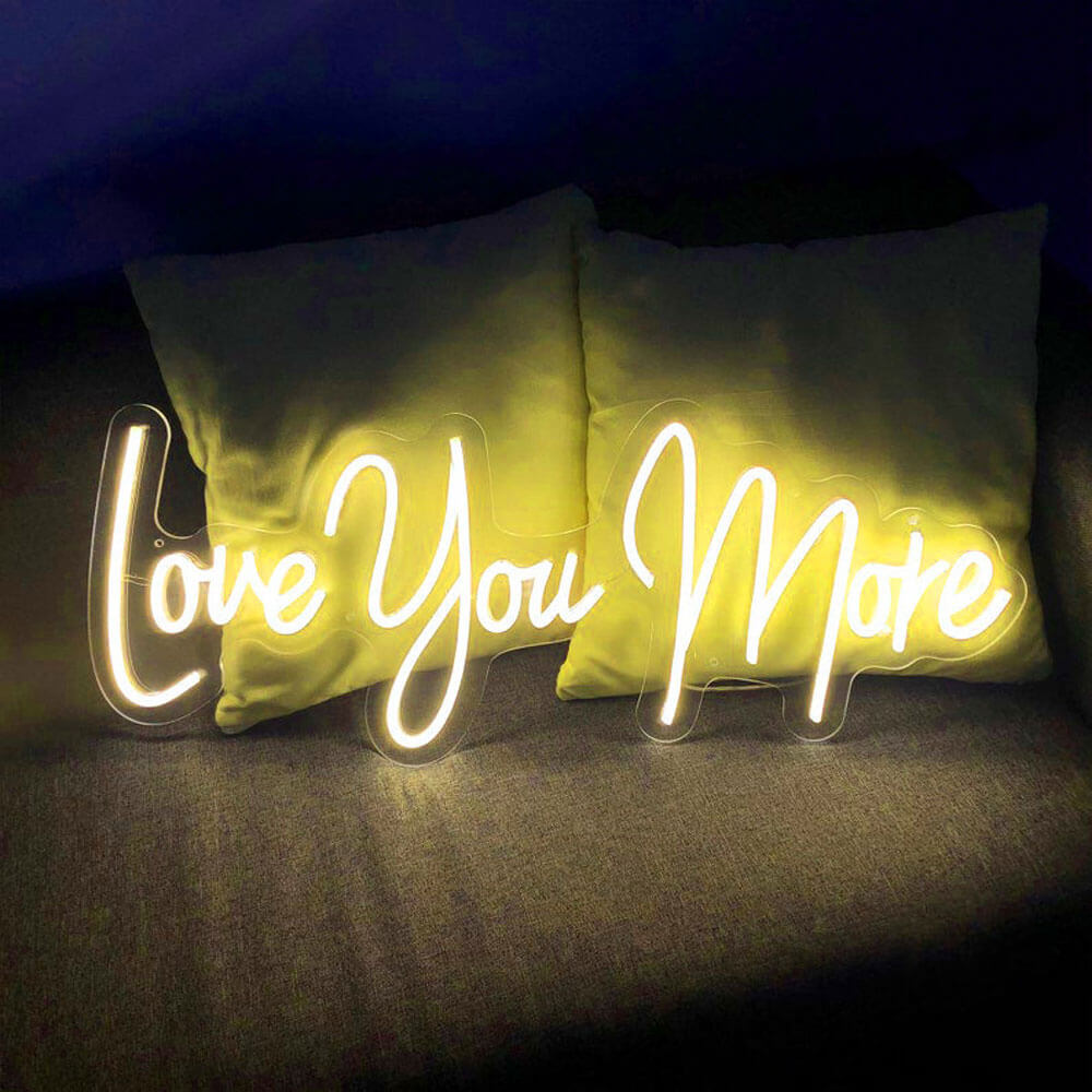 love you more neon sign yellow