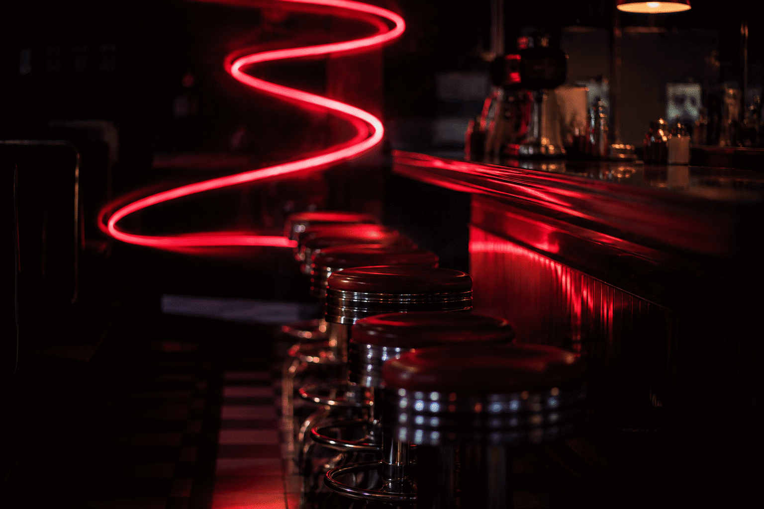 Coca-Cola Neon Signs — visual for the section “The Modern Route and the Trademark Picture”: dark scene, glowing neon focal point, shallow depth of field