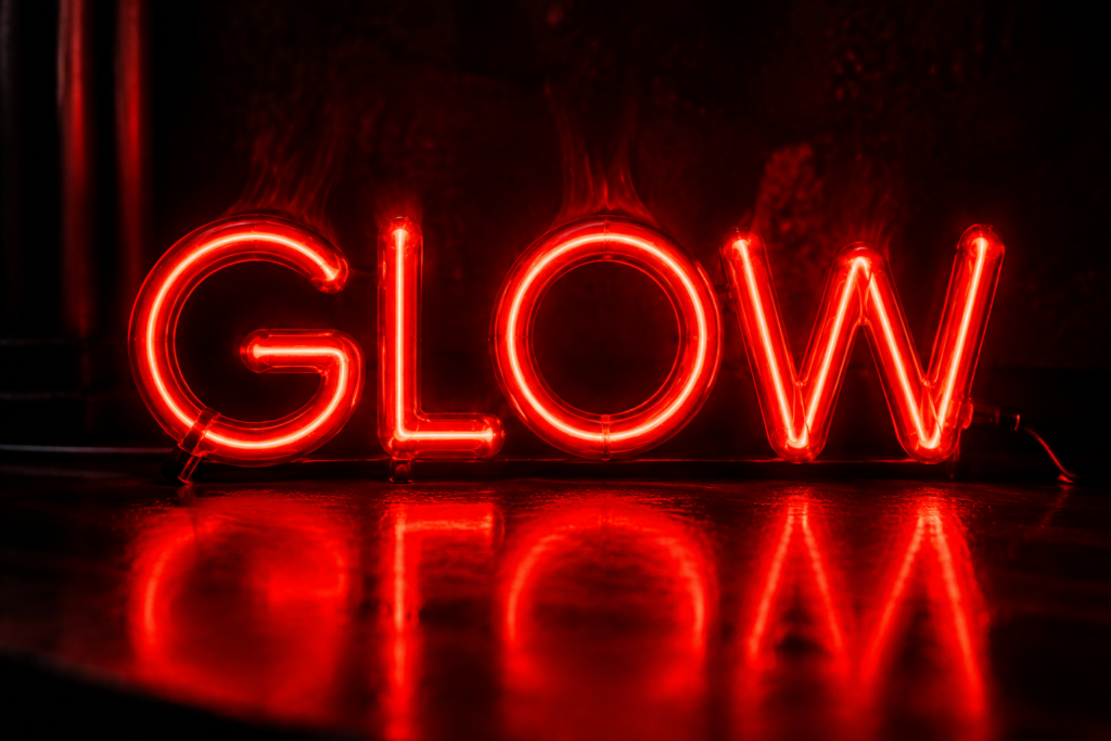 Dark scene with a glowing red neon sign reading GLOW